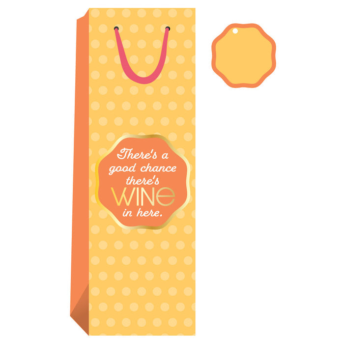 The Good Chance- Wine Bag by Drinks On Me features a yellow polka-dot design, orange handle and tag, and reads "There's a good chance there’s WINE in here"—a playful, reusable option for gifting wine.