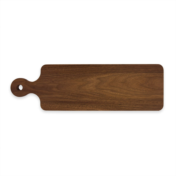 The Maple Handled Walnut Bread Board (20" x 6") features a rectangular shape with a rounded handle and hanging hole, perfect for serving appetizers, shown on a white background.