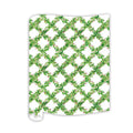 The Rosanne Beck Holly Berry Trellis Table Runner (20x12") features a festive green leafy and pink floral pattern on white, perfect for adding charm to your Christmas table decor. Disposable for easy cleanup.