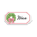 The Rosanne Beck Holly Wreath Place Card (10pk) features a white card with a red border, a green wreath with red and white bow on the left, and space for names—ideal as buffet labels or place cards.