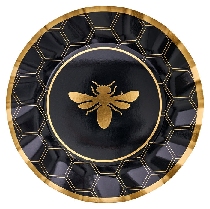 The Sophistiplate Honeybee Dinner Plates (8pk) feature a round black design with a gold honeycomb pattern, a gold bee illustration in the center, and an elegant gold rim—perfect for bringing sophisticated charm to any celebration.