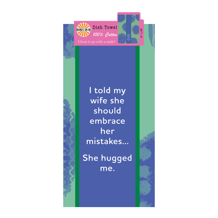 The Hugged Me Dish Towel by Drinks On Me features blue and green colors with white text: "I told my wife she should embrace her mistakes... She hugged me." Made of 100% cotton, this towel makes a humorous kitchen gift.
