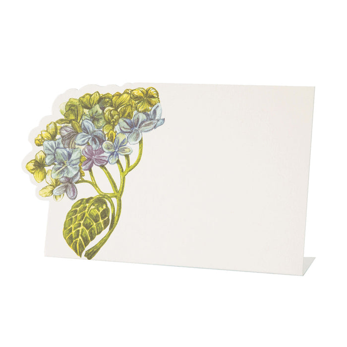 A blank table place card by Hester & Cook, featuring pastel yellow and light blue hydrangea flowers with green leaves in the upper left corner. Hydrangea Place Card - Set of 12. Perfect for your next gathering.