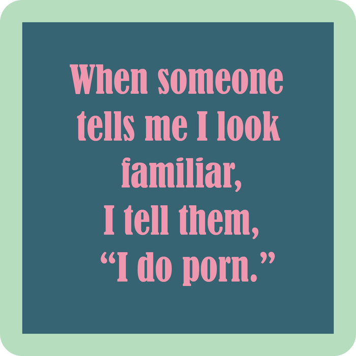 The I Do Porn Coaster by Drinks On Me features pink text on a blue background with a light green border, reading: "When someone tells me I look familiar, I tell them, I do porn." Great for funny drink coaster collectors or bar cart accessories.