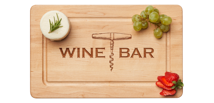 The Maple Wood Cheeseboard | Wine Bar | 13 x 8" by Maple features an engraved "WINE BAR" and corkscrew—ideal for serving cheese, grapes, strawberries, and herbs for a sophisticated charcuterie display.