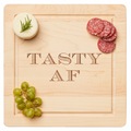 The Maple Wood Cutting & Cheeseboard Square by Maple, engraved with "Tasty AF" and measuring 12 x 12", is a perfect statement piece for serving cheese, cured meats, and grapes at your next gathering.