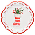 The Sophistiplate Merry and Bright Salad Plates (8pk) feature a festive design with a decorative red scalloped edge and a Christmas stocking adorned with greenery, holly, and two candy canes. The stocking showcases red and white stripes with a fluffy white cuff, making these plates perfect for creating a cheerful holiday table setting.