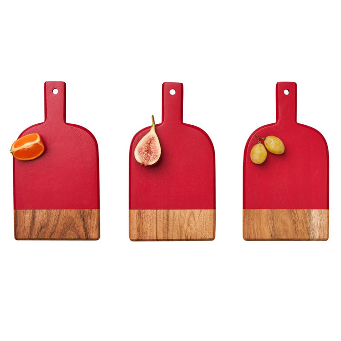 Three Maple Mini Bevel Boards—Set of 3 with Ribbon, Red, 8x4.25"—are arranged in a row displaying an orange slice, half a fig, and two green grapes on a white background.