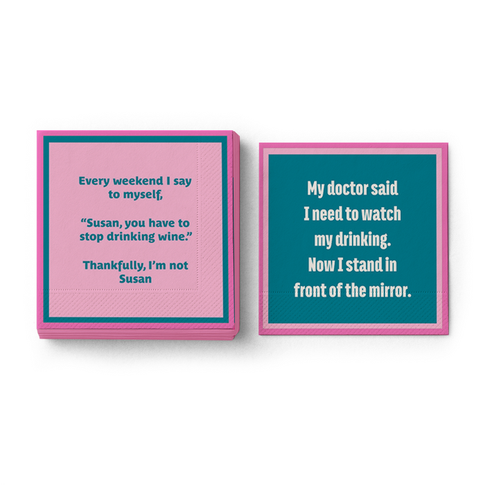 Set of two pink and teal Mirror Napkins by Drinks On Me with witty drink quotes—one says, "Susan, you have to stop drinking wine," the other, "My doctor said I need to watch my drinking." Great as wine napkins or bar cart accessories.