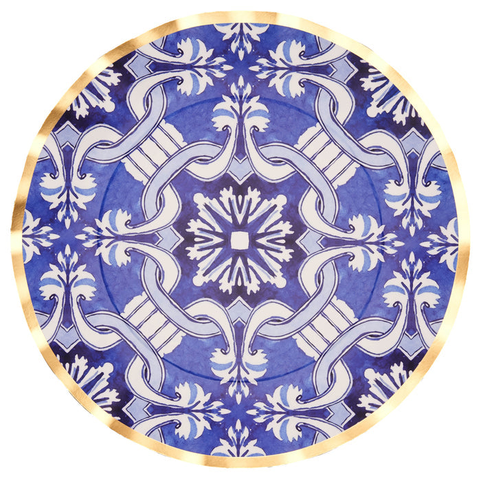 The Sophistiplate Moroccan Nights Wavy Paper Dinner Plate (8pk) features an intricate blue and white floral and geometric pattern with a thin gold border, reminiscent of elegant Moroccan tile designs.