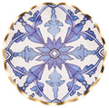 The Sophistiplate Moroccan Nights Wavy Paper Salad Plate (8pk) features a ruffled gold rim and a symmetrical blue floral and geometric Moroccan tile pattern on a white background.