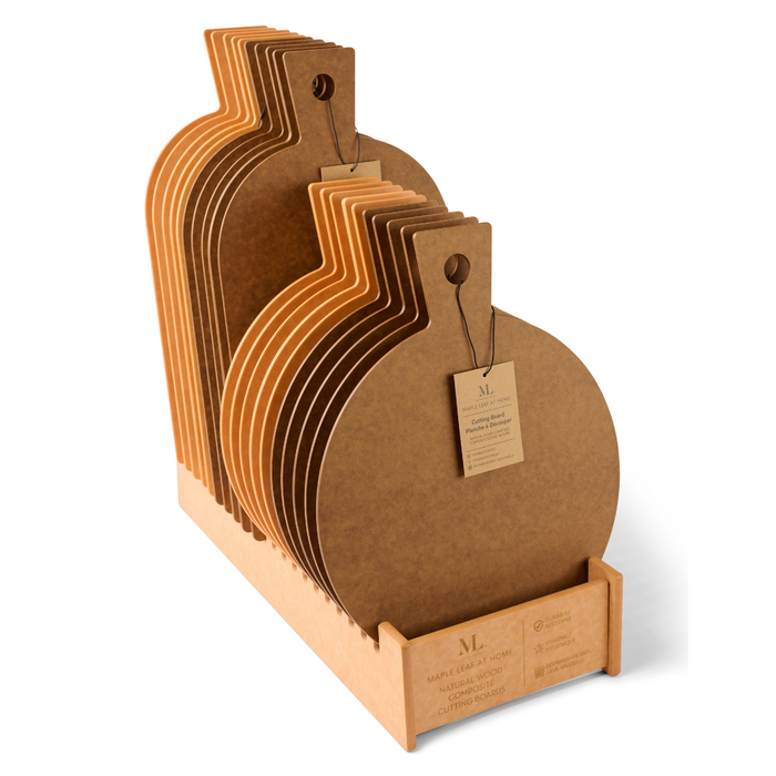 A set of Maple Natural Wood Composite Hostess Boards, round and brown with handles, arranged upright in a wooden holder featuring engraved text. Each heat-resistant board has a tag near its handle.