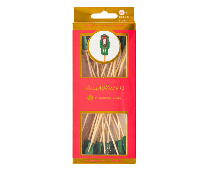 A 30-pack of Simply Serv’d Nutcracker Christmas Large Cocktail Picks, each with a nutcracker face. The eco-friendly, compostable picks are visible through the red packaging’s clear window.