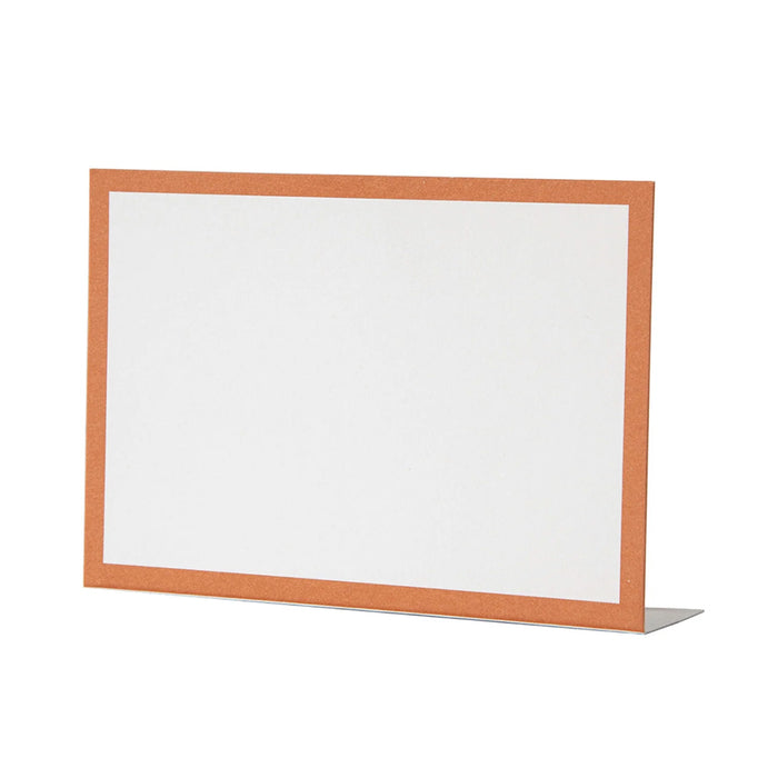 The Hester & Cook Orange Frame Place Card (12ct) is displayed upright on a stand. Featuring a plain white background with an orange border, it's ideal for use as place cards or buffet labels.
