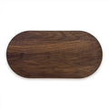 The Maple Oval Walnut Wood Artisan Board (20 x 9") features a smooth, dark wooden surface with visible grain and is shown on a white background.