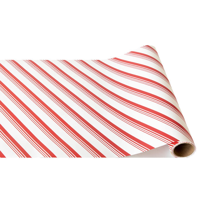 The Hester & Cook Peppermint Stripe Runner (20x25") features diagonal red and white candy cane stripes—ideal for adding festive flair to packages or as a creative table runner for holiday gatherings.
