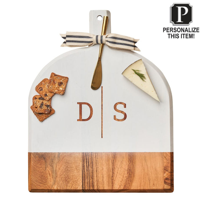 The Maple Personalized Acacia Bevel Board in white (15" x 12" x .6") features a striped bow, gold cheese knife, crackers, cheese slice, and engraved initials D | S. Corner text: PERSONALIZE THIS ITEM!.