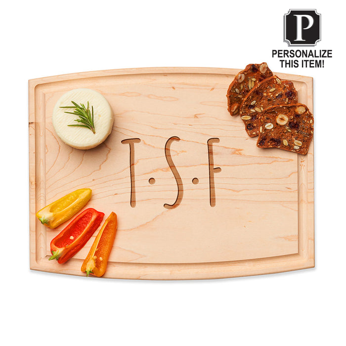 A Maple Personalized Arched Artisan Maple Board (12 x 9") engraved with initials sits with round cheese topped with rosemary, bell pepper slices, and four nut and fruit crispbreads. A "Personalize This Item!" label is in the top right corner.