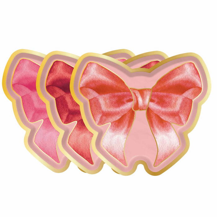 Eight Pink Bows Assorted Die Cut Salad Plates by Sophistiplate, featuring a satin-like pink finish with gold edges and bow shapes—perfect for adding elegance to your Valentine’s Day celebration.