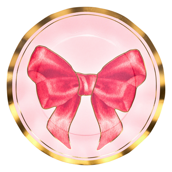 Part of the Sophistiplate Pink Bows Dinner Plates/8pk collection, these pink plates with a gold rim showcase a bold red bow design at the center—ideal as birthday party tableware or disposable party plates to bring a charming touch to your celebration.