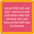 The PMS OCD Coaster by Drinks On Me is a pink square with a bold orange border and witty white text. It’s the perfect funny drink coaster or quirky bar cart accessory—great for unforgettable housewarming gifts!.