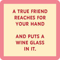 A beige square with a pink border reads: A true friend reaches for your hand and puts a wine glass in it. This bold red coaster from Drinks On Me’s Best Sellers bundle makes a hilarious party gift or fun addition to any set.