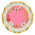 The Sophistiplate Rococo Salad Plates (8pk) feature a round, wavy edge with a gold rim, pink center adorned with colorful flowers and green leaves, and a cream border with a gold diamond pattern.