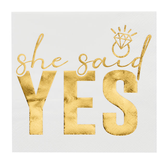 Sugarplum’s She said Yes Cocktail Napkins (26pk) feature "she said YES" in gold and a diamond ring above "said"—perfect for bridal showers or bachelorette parties.