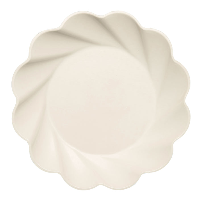 The Eco Cream & Sage Table Setting by Sophistiplate LLC features a round, cream-colored plate with scalloped edges and a subtle swirling pattern, set against a white background. Eco-friendly design combines elegance with sustainability.