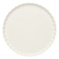 A round, plain white tart or quiche pan with a fluted edge is shown from above on a white background, ideal for serving with Sophistiplate's Simply Eco Dinner Plate- White/8pkg.