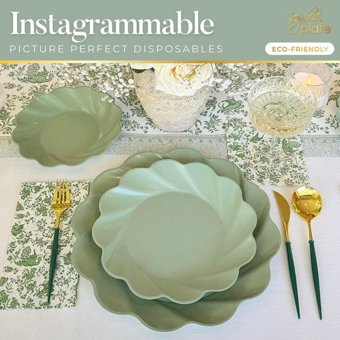 The Eco-friendly Table Setting- Sage by Sophistiplate LLC features stylish green plates, gold and green cutlery, a floral napkin, and a white flower centerpiece for an elegant, sustainable dining experience.