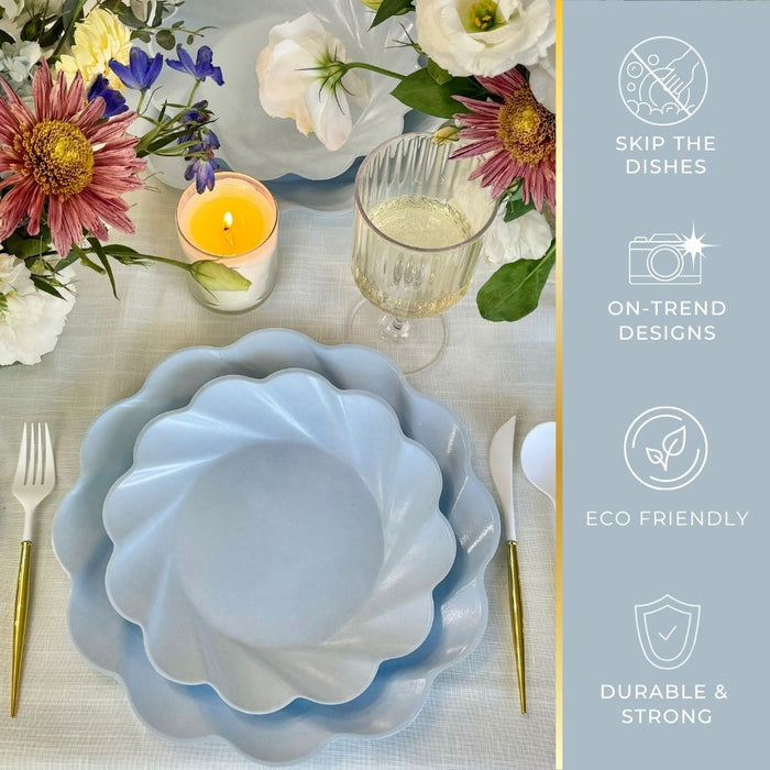 A table set with Sophistiplate’s Eco-Friendly Table Setting- Sky Blue features wavy-edged compostable plates, a glass of white wine, gold-white cutlery, a lit candle, and flowers. Icons highlight no-washing, style, eco-friendly materials, and durability.