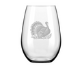 The Maple Stemless Wine Glass | Turkey | 21oz features an etched design of a turkey standing on foliage.