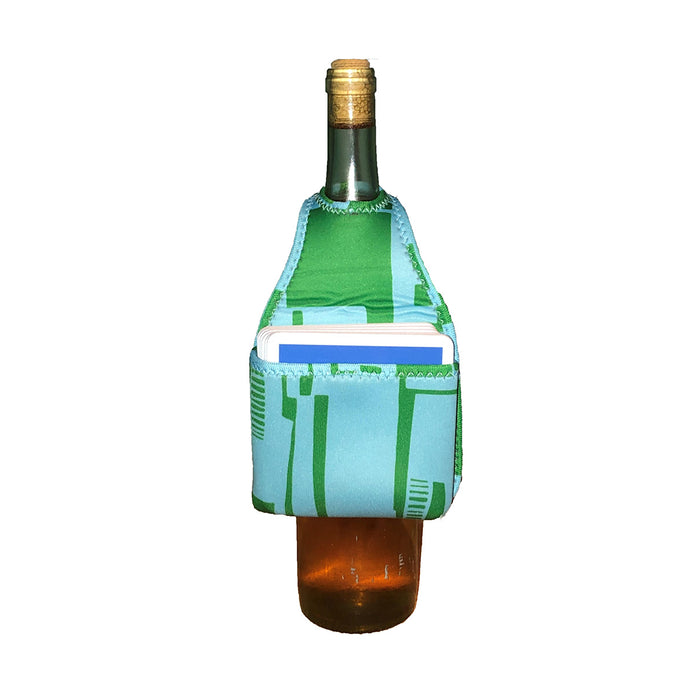 The HOOK-r by Drinks On Me is a green and blue neoprene wine bottle pouch that wraps around the neck, featuring a pocket for a rectangular item. The stylish accessory is set against a plain white background.