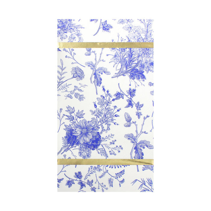 Elevate your table setting with the Sophistiplate Timeless Guest Towels/20pk—white napkins beautifully decorated with intricate blue floral and leaf motifs and accented by two horizontal metallic gold stripes along the top and bottom edges, ideal for anyone seeking elegant guest towels that add a sophisticated touch to any occasion.