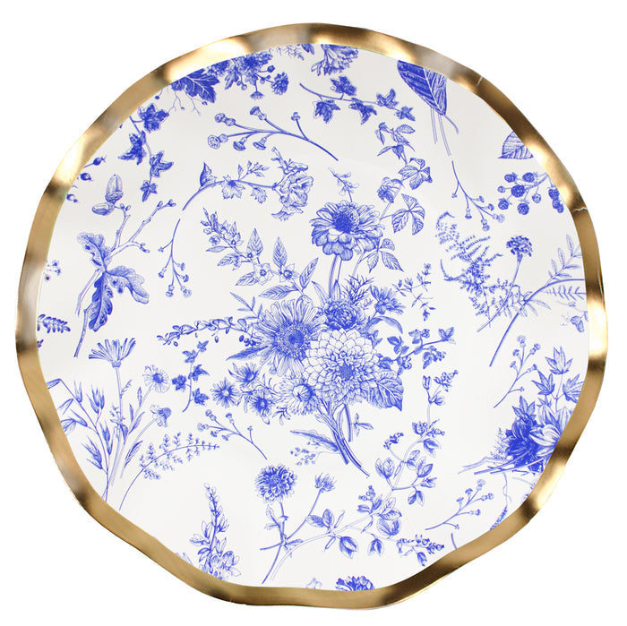 The Sophistiplate Timeless Salad Plates (8pk) feature a round white surface with a wavy gold rim, adorned with elegant blue floral and botanical designs—perfect disposable plates for special occasions.