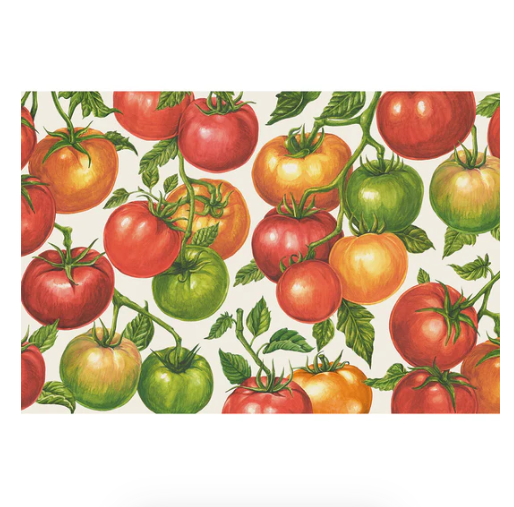 A seamless pattern of ripe red, orange, yellow, and green tomatoes with stems and leaves on a light background, inspired by the Tomato Vine Placemat - Pad of 18 Sheets from Hester & Cook.