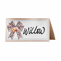 A folded Rosanne Beck Turkey & Gourds Bow Place Card with "Willow" in black cursive, featuring a brown and white checkered bow and small gourds—ideal for buffet labels or special events. Comes in a 10-pack.