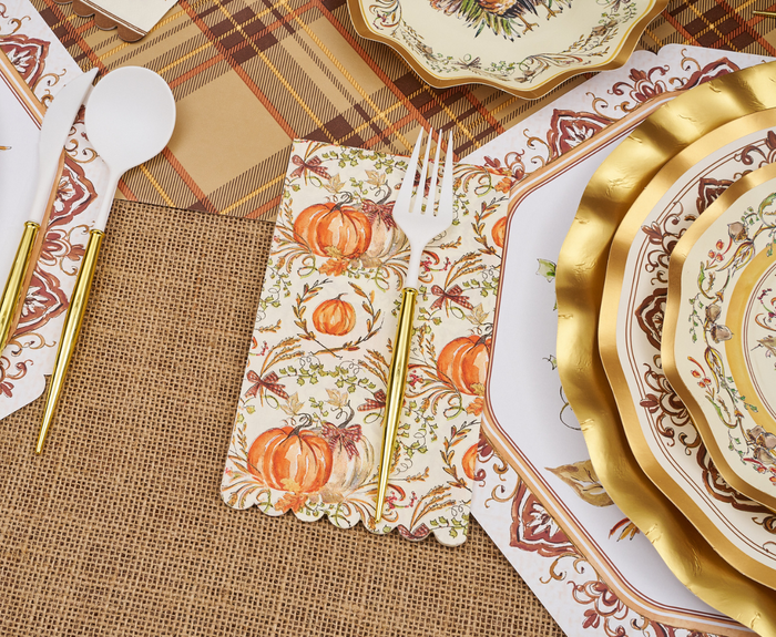 Create a festive autumn table with Sophistiplate Turkey & Gourds Guest Towels, gold-rimmed plates, gold-handled cutlery, and a plaid burlap tablecloth—perfect for your seasonal gatherings.