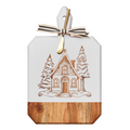 The Maple Acacia Heirloom Board Rectangle in white (16x10") features an engraved Christmas Cottage, gold spreader, and striped ribbon—perfect as a charming charcuterie board.