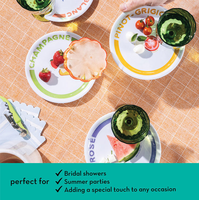 Maple’s Wine Holder Appetizer Plates by Meg Quinn feature Champagne, Rosé, and Pinot Grigio labels with fruit designs. These colorful melamine plates are perfect for parties, showers, wine tastings, and special occasions.