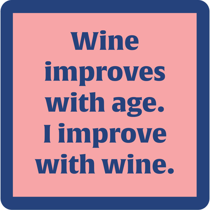 The Drinks On Me Coaster Bundle: Birthday features a pink square with a blue border and bold blue text: "Wine improves with age. I improve with wine." A funny, giftable set perfect for friends.