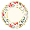 The Sophistiplate Winter Blossom Paper Dinner Plate (8pk) features a scalloped round edge with gold trim, decorated with red, white, and blush flowers, green leaves, and berries; the cream-colored center is blank.