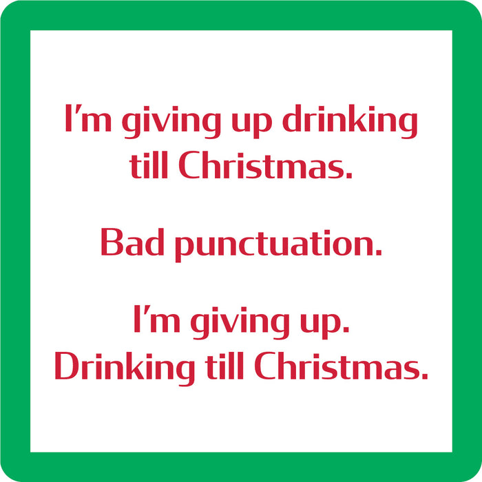 The Drinks On Me Xmas Punctuation Coaster features a text joke in red lettering on white with a green border: "I'm giving up drinking till Christmas. Bad punctuation. I'm giving up. Drinking till Christmas." Fun gift for any home!.