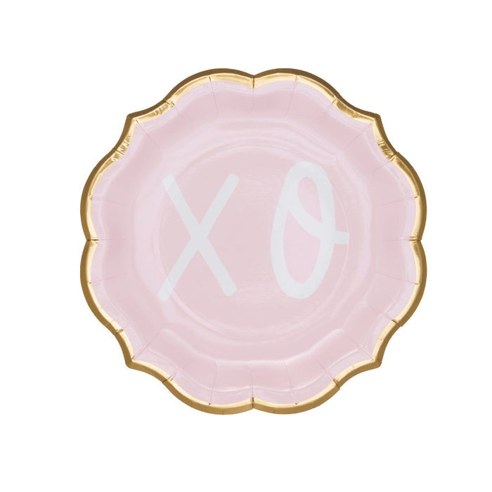 The Sugarplum XOXO Salad Plates/8pk feature round, light pink disposable plates with scalloped gold edges and bold white XO letters—perfect for Valentine’s Day or as chic pink party plates for any celebration.