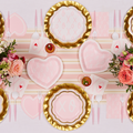 Create a romantic Valentine’s Day table with Sugarplum XOXO Dinner Plates (8pk), gold accents, heart-shaped dishes, striped placemats, pink utensils, floral centerpieces, and napkins decorated with red hearts.